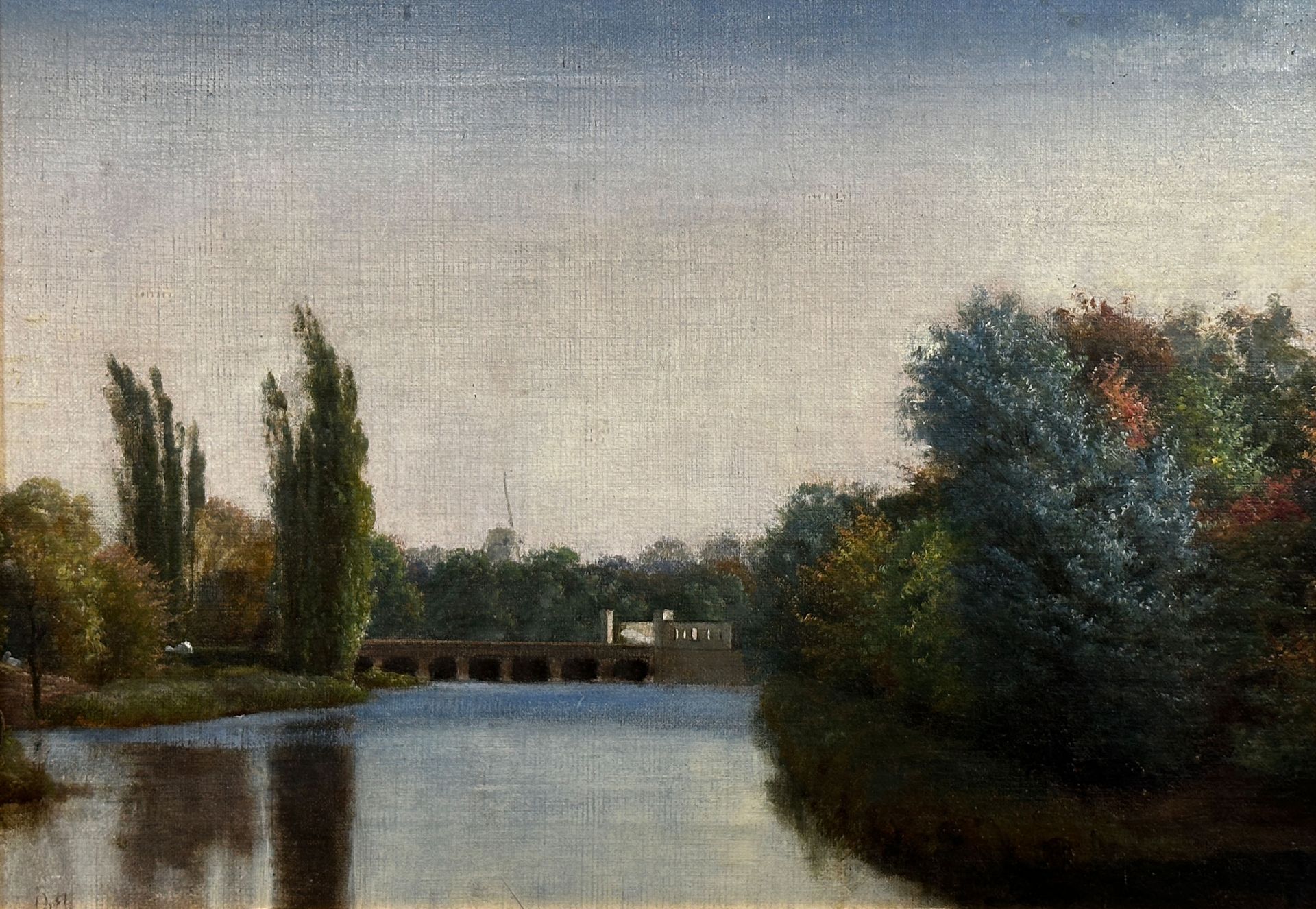 Attributed to Emil Cordius ORTH (1833 - 1919). River landscape with bridge and mill.