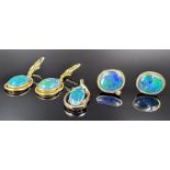 Jewellery set with opal doublets. Yellow gold of various alloys.