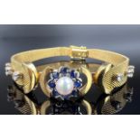 Bracelet. 750 yellow gold with diamonds, sapphires and a pearl.