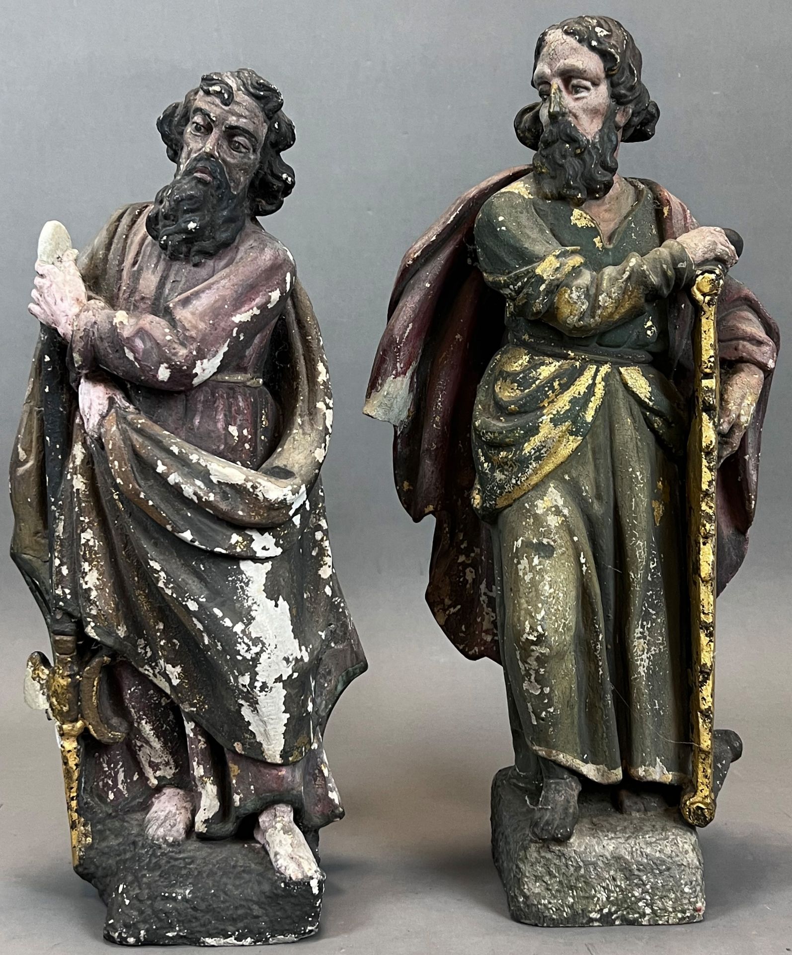 2 Steinfiguren. Heilige mit Säge und Lanze. 1. Hälfte 19. Jahrhundert.