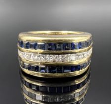 Ladies' ring. 750 yellow gold with diamonds and sapphires.