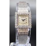 GÜBELIN. 750 white gold ladies' wristwatch set with diamonds. 1960s.