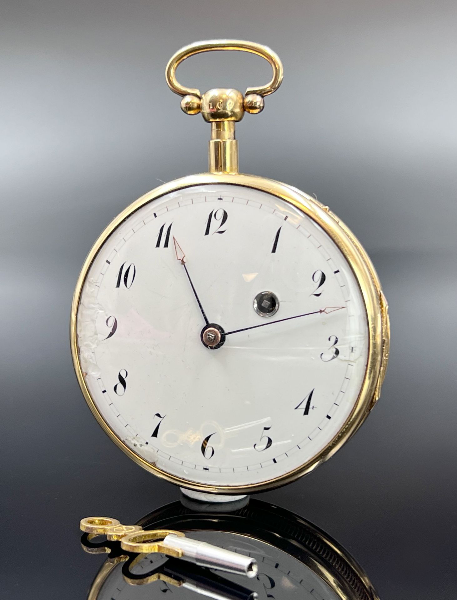 GEBRÜDER KINZIG Neuwied. 750 Gelbgold. Bedeutende deutsche Spindeltaschenuhr. Um 1800.