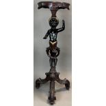 Blackamoor torch stand. Wood. Late 19th century.