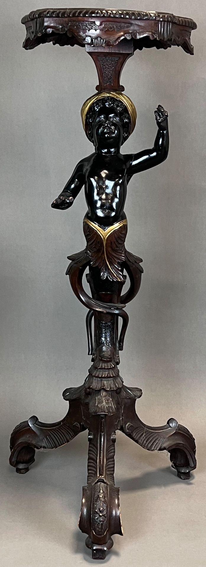 Blackamoor torch stand. Wood. Late 19th century.