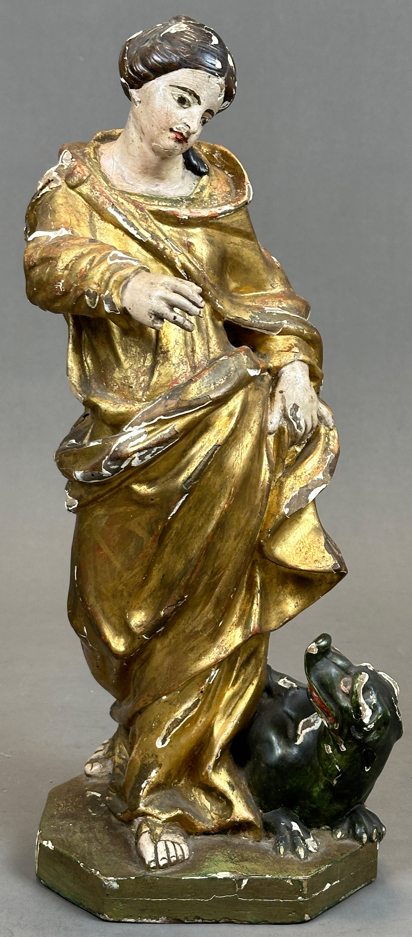 Wooden figure. Mary Immaculate with dragon. 18th century. South Germany.