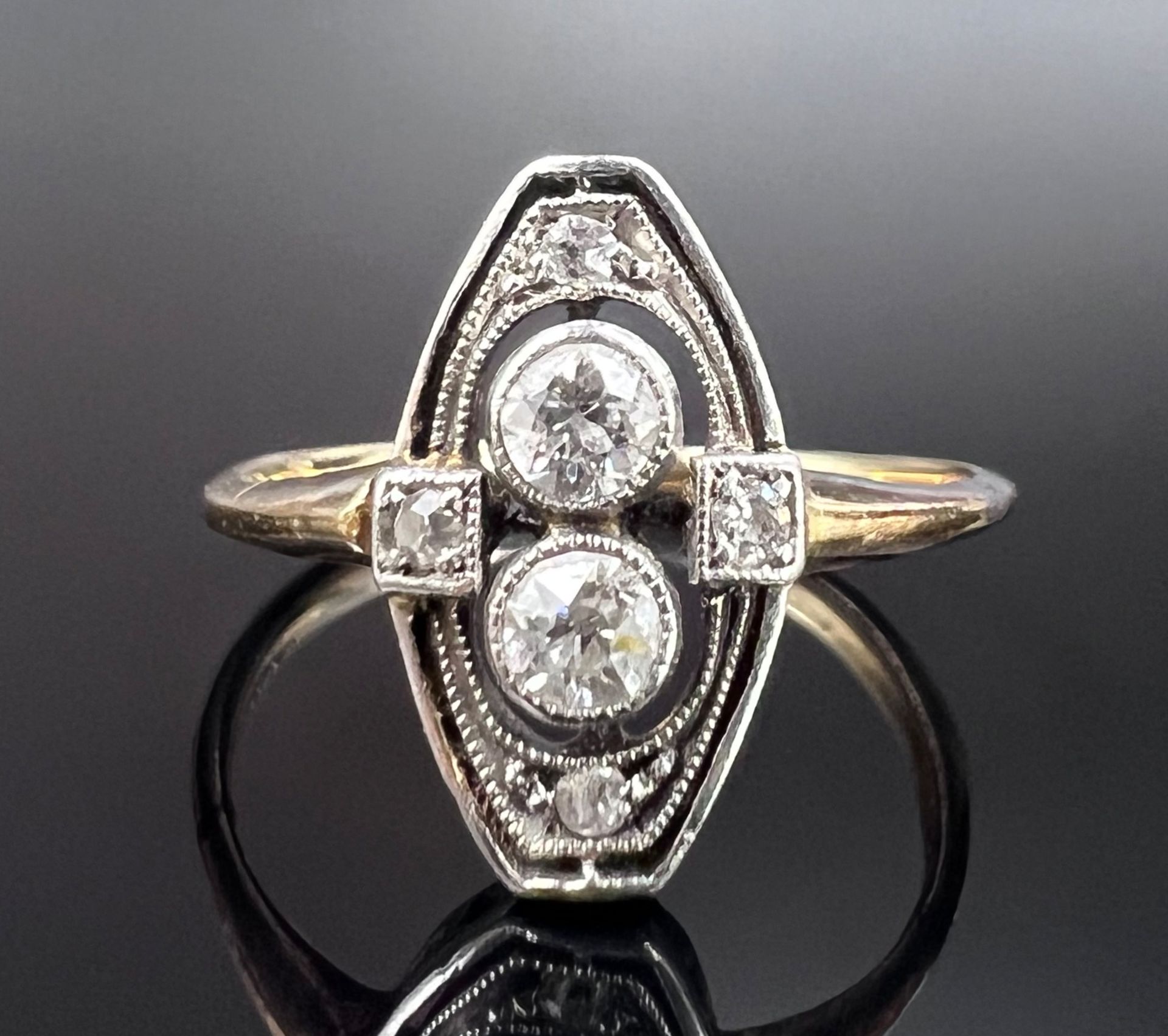 Ladies' ring. 585 yellow gold and white gold set with diamonds. Art déco. 1920/30s.