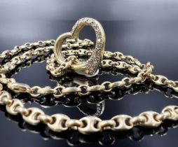 Heart-shaped pendant with necklace. 585 yellow gold with diamonds.