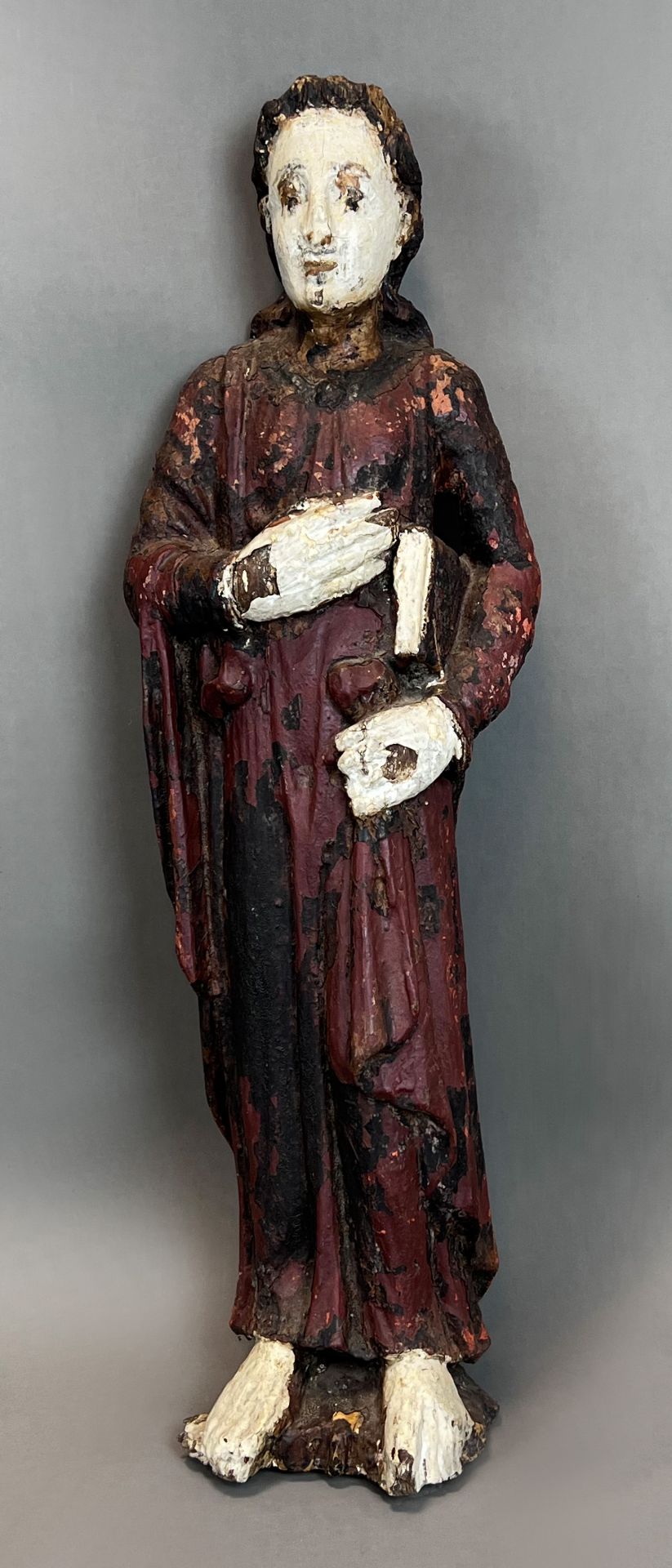 Romanesque figure of a saint. Clergyman. Probably 13th century.