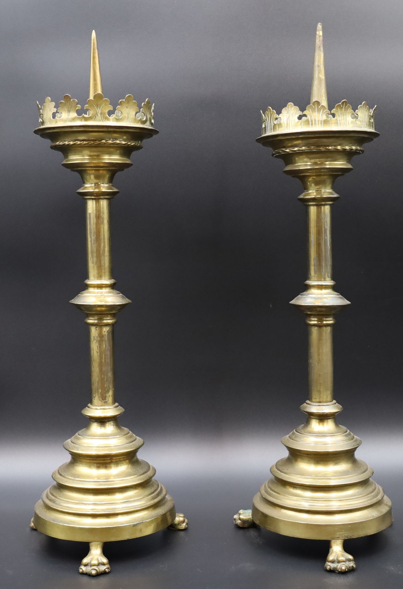 Two altar candlesticks. Brass. Around 1900.