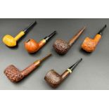 Six tobacco pipes. Partly marked.
