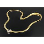 Necklace. 585 yellow gold and white gold with small diamonds and a sapphire.