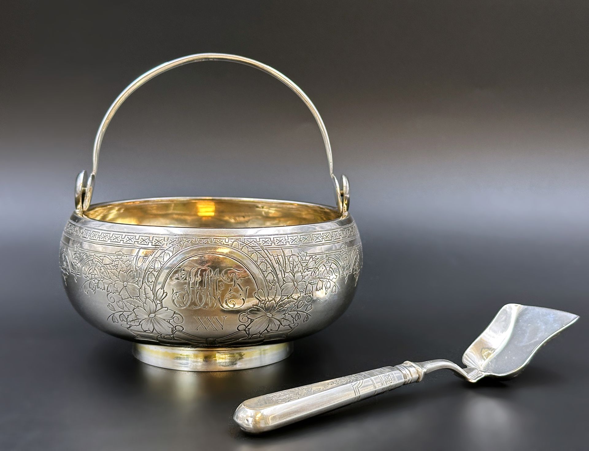 Sugar bowl with handle and sugar spoon. 84 Zolotniki. Russia 1886.