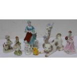 Acht Porzellanfiguren
