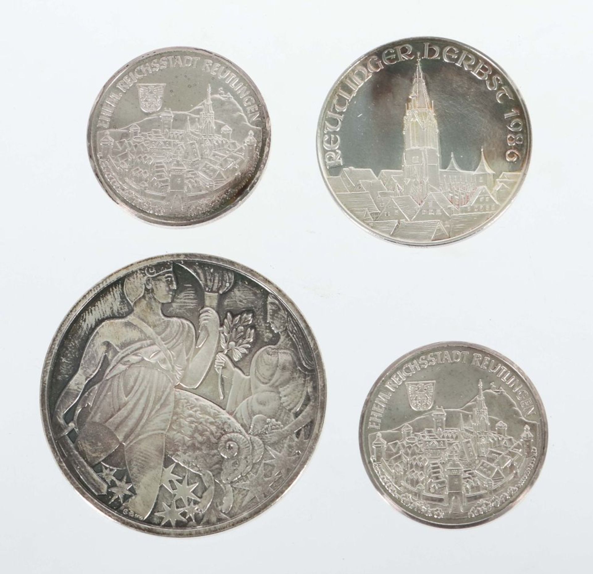 4 Medaillen Silber, ca. 9,9 g,