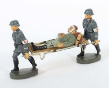 DRK-Figuren Elastolin, 2 Bahrenträger