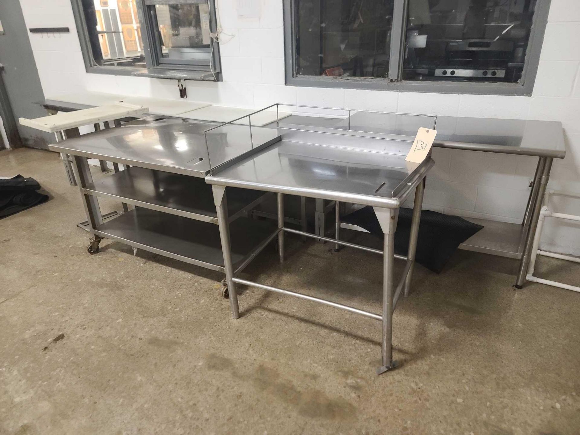 Five Stainless Steel Tables