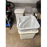 4 plastic tubs on wheels