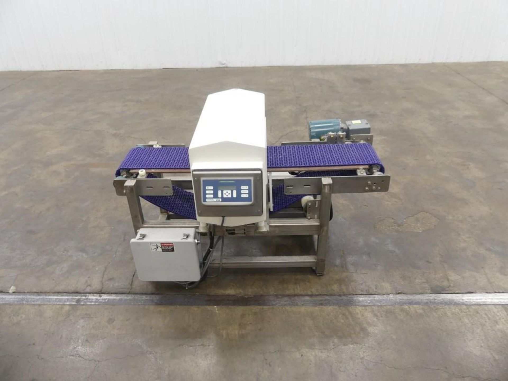 Schneider Packaging Equipment Co. 57SS10BAB with a Goring Kerr Metal Detector