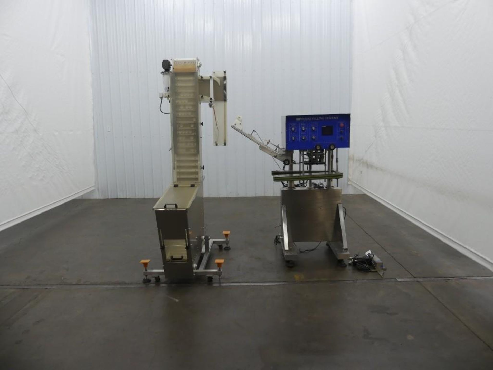 Inline Filling Systems Capper and Elevator