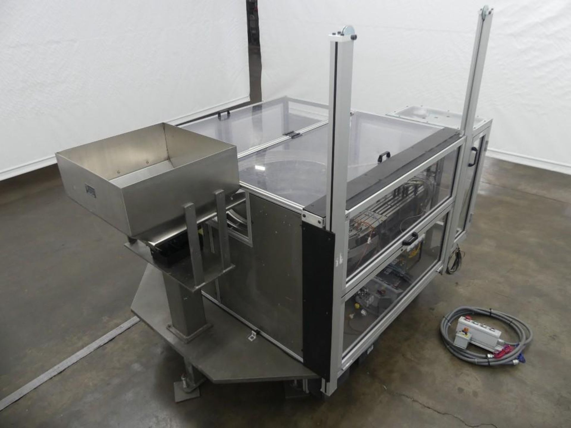 Performance Feeders, Inc. Stainless Steel Vibratory Cap Feeder And Sorter