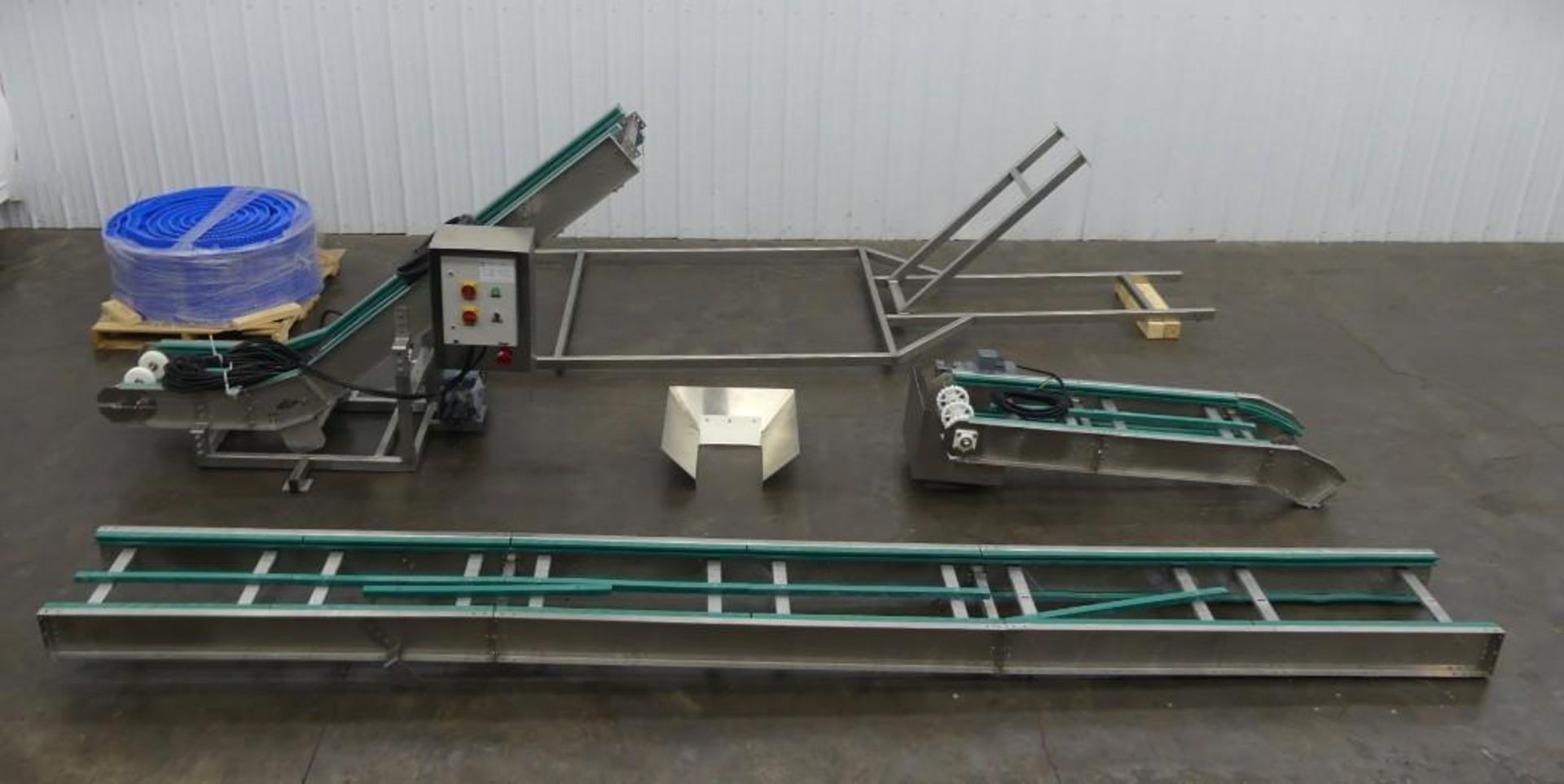 Plan It Packaging Inc. Conveyor Cleated Blue Belt Incline Conveyor