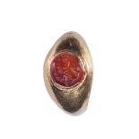 A very unusual Roman intaglio carved in carnelian