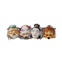 Japanese, Circa 1930, A porcelain and silver seven portrait Gods bracelet