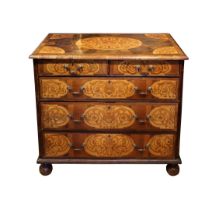 Italian, 18th century, an impressive walnut and inlay chest of drawers