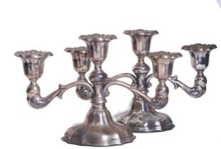 Chinese, Early 20th Century, A pair of sterling silver candelabra