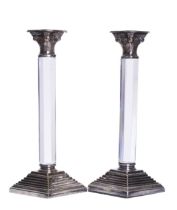 Circa 1980, A pair of silverplate and glass candlesticks