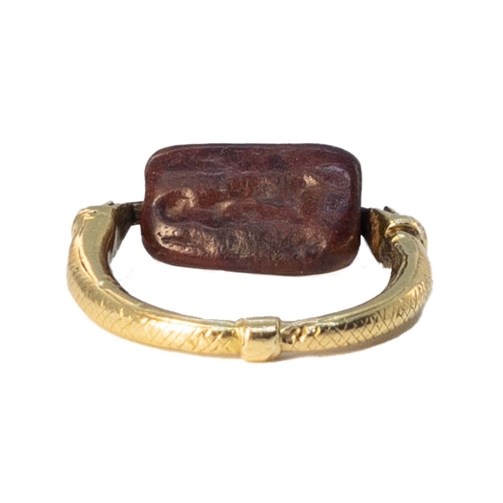 An ancient jasper Babylonian three sided swivel seal set in a 19th Century gold snake ring