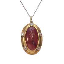 A large Greek oval carnelian intaglio pendant of a Greek female figure