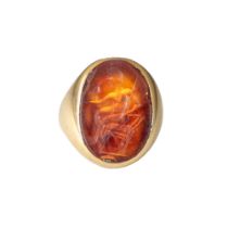 A large Roman carnelian intaglio set in a heavy antique gold ring