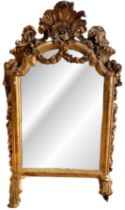 British, 18th century, A carved and gilded dresser mirror