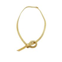 British, 1972, A 9 carat gold flexible brick link necklace