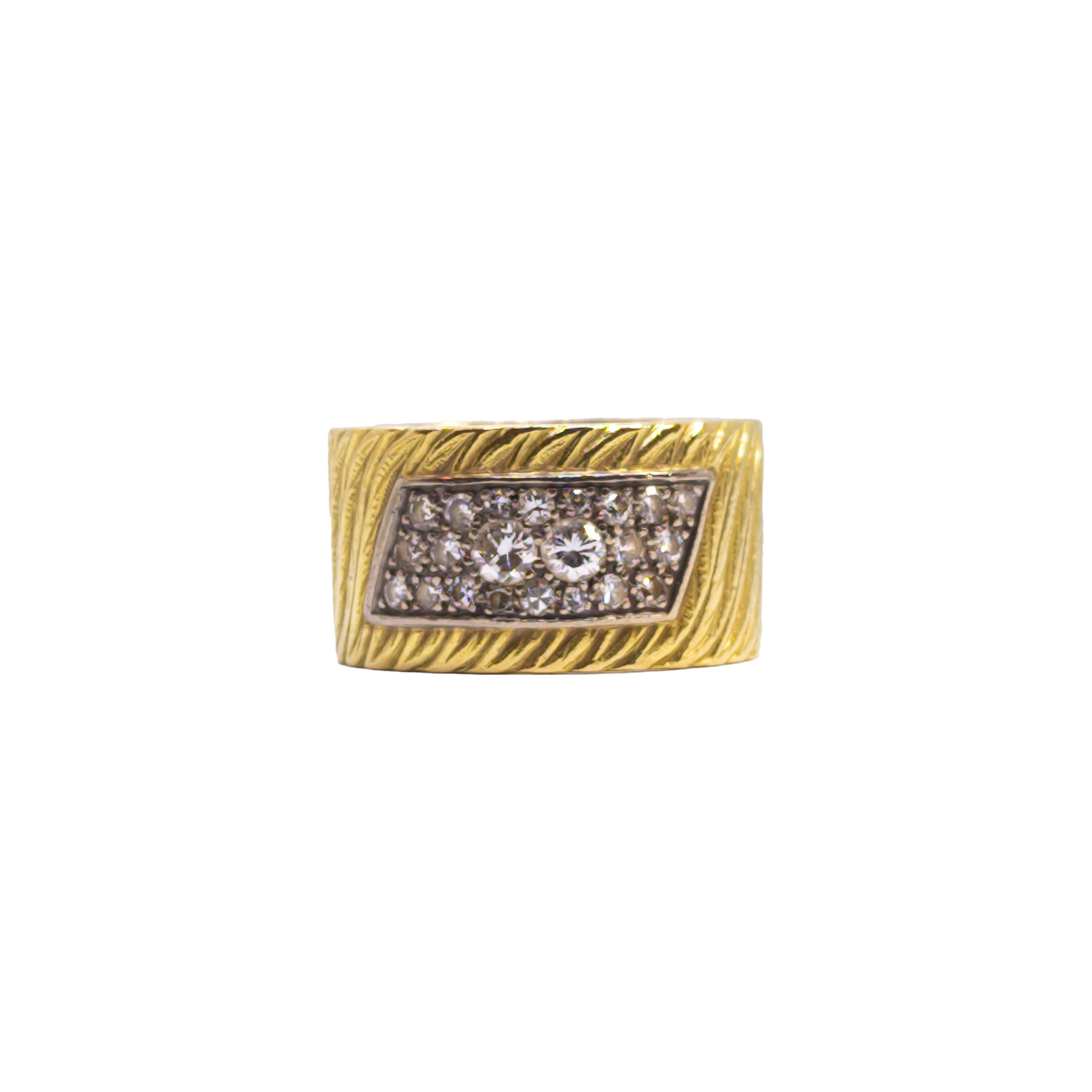 British, Circa 1970, A diamond and 18 carat yellow gold band ring