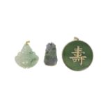 Chinese, Circa 1950, A group of three jadeite pendants