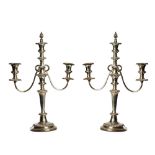 British, 20th Century, A pair of silver plate candelabra