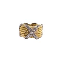 Tiffany and Co., Circa 1980, A Schlumberger diamond and 18 carat yellow gold band ring