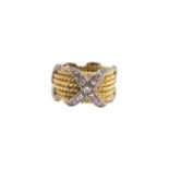 Tiffany and Co., Circa 1980, A Schlumberger diamond and 18 carat yellow gold band ring