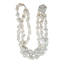 Continental, Contemporary, An impressive three-row Baroque pearl festooned necklace