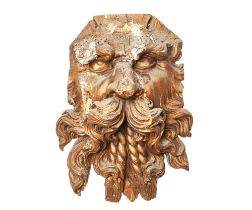 British, Early 18 Century, A carved giltwood Neptune architectural element