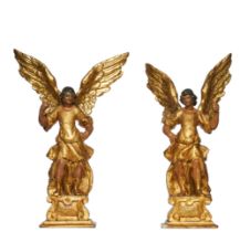 Italian, 19th Century, A pair of giltwood and polychrome decorated models of angels