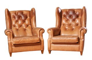 French, Circa 1950, A pair of two Chesterfield-style wingback chairs and footstool