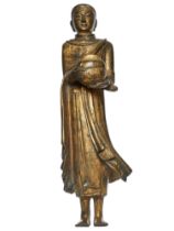 Chinese/Nepalese, 18th-19th Century, A gilt bronze figure of a monk