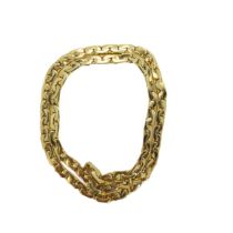 Italian, Circa 1970, A heavy 18 carat gold flat curb link long chain