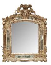 Continental, 18th Century, A carved and silvered mirror