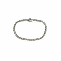 British, Circa 1990, A fine brilliant cut diamond line bracelet