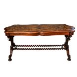 Circle of Gillows, Early Victorian, An extremely fine walnut topped marquetry library table